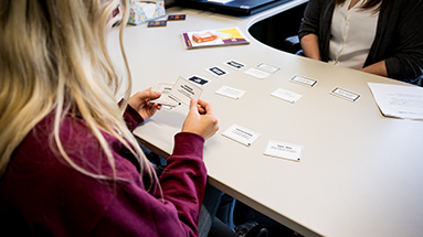 Student doing a career activity with cards