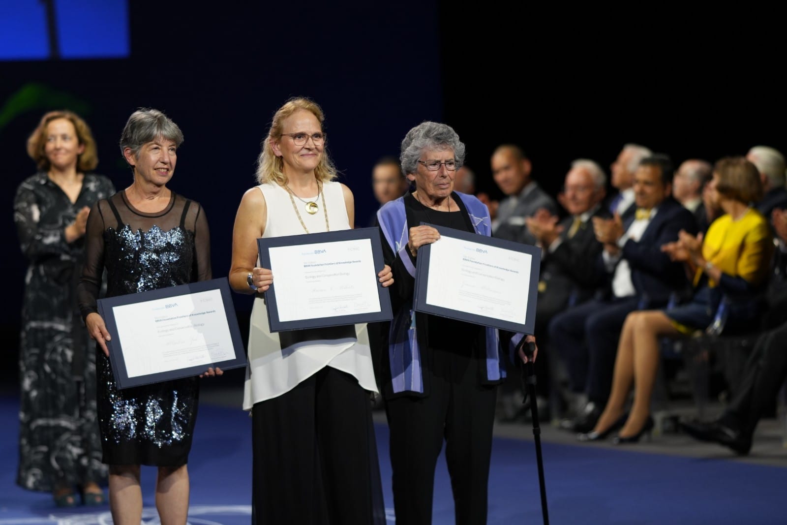 Photo of Dr Zuk accepting an award in Spain 