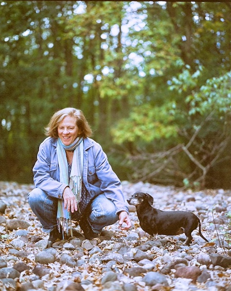 Artist Linda Buturian and her dog Josie