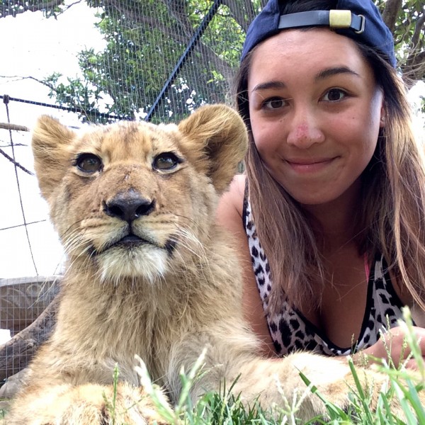 Ana with a lion cub
