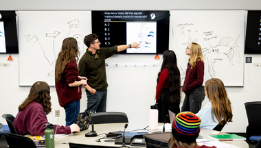 Teaching Associate Professor Charlie Willis interacting with students