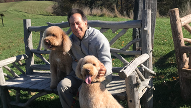 Russell Rothman with two dogs