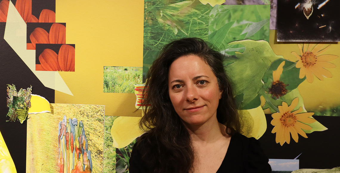 A photograph of the artist Regan Golden in front of a collage she created with photographs of plants.