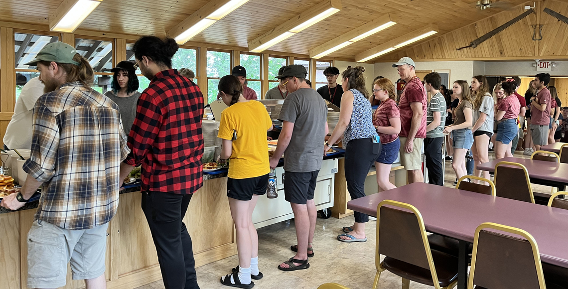 People standing in line in the Itasca dining hall